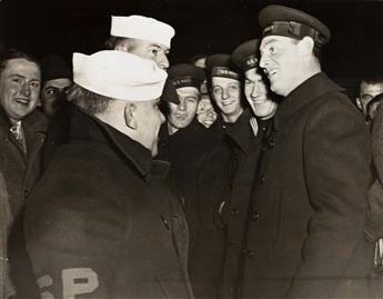WEEGEE [ARTHUR FELLIG] (1899-1968) A pair of photographs, one showing a policeman in a crowd, the other a group of Navymen.